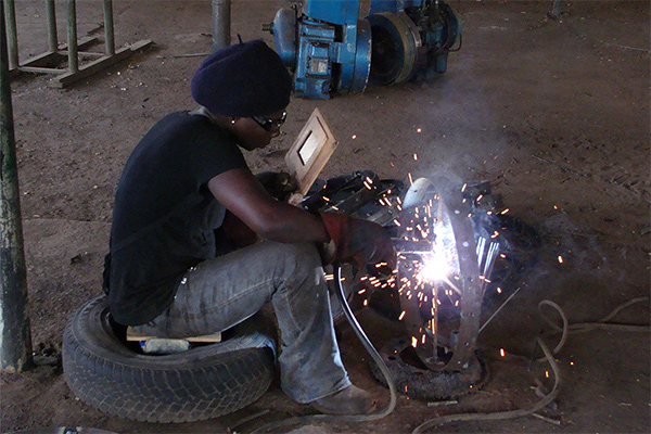 African man on phone
